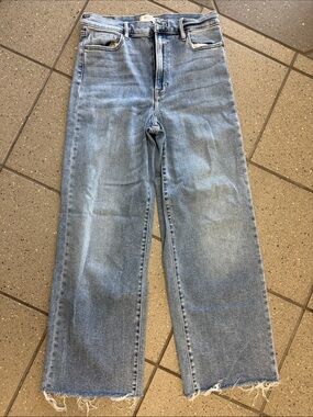 High-Rise Light Blue Wide-Leg Jeans with Raw Hem